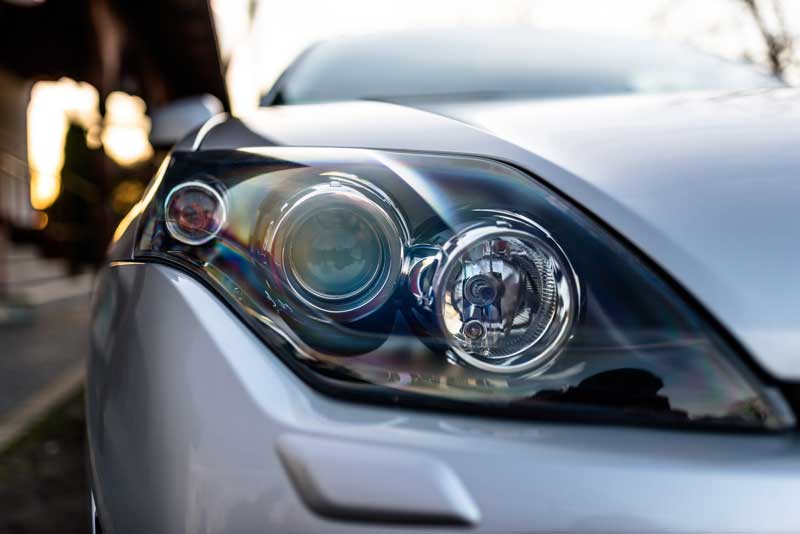 Close up of headlight. Find important features of your car.